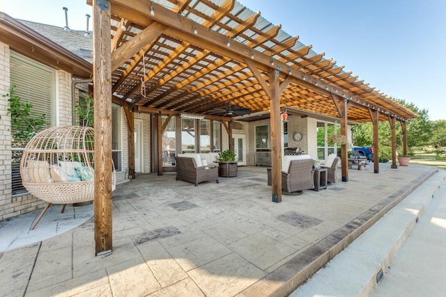 view of patio / terrace with outdoor lounge area and a pergola