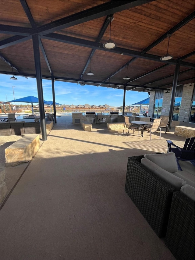 view of patio / terrace with outdoor lounge area and a mountain view