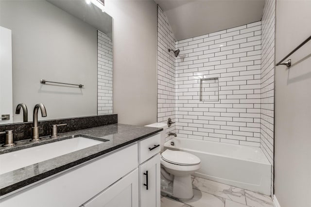 bathroom featuring toilet, marble finish floor, tub / shower combination, and vanity