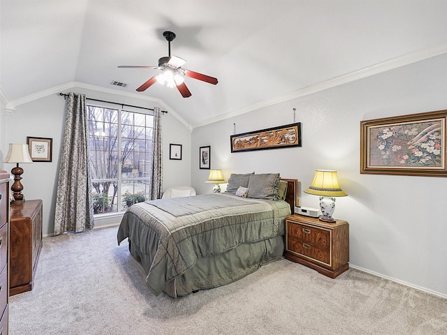 bedroom with visible vents, ornamental molding, light carpet, vaulted ceiling, and ceiling fan