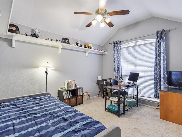 carpeted bedroom with multiple windows, vaulted ceiling, and ceiling fan