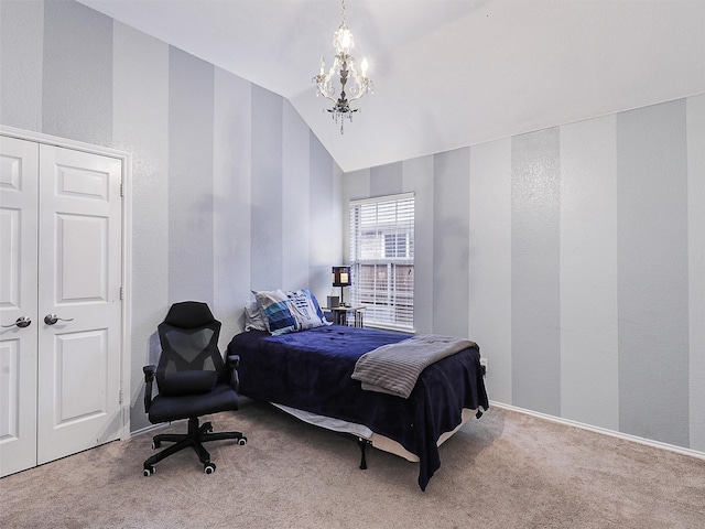 bedroom featuring lofted ceiling, baseboards, carpet flooring, and a notable chandelier