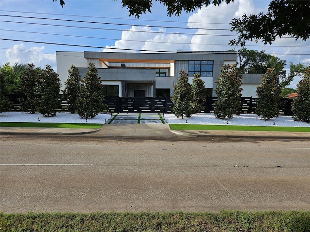 contemporary house featuring stucco siding