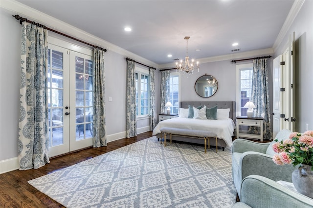 bedroom featuring ornamental molding, dark wood-type flooring, and french doors