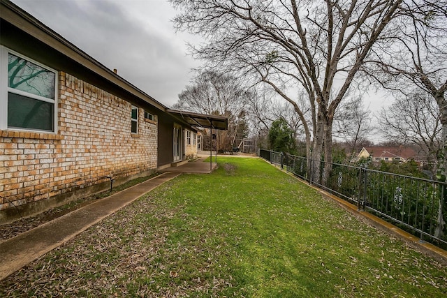 view of yard featuring fence