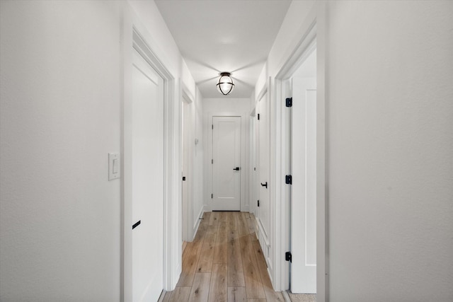 hall featuring light wood-style flooring