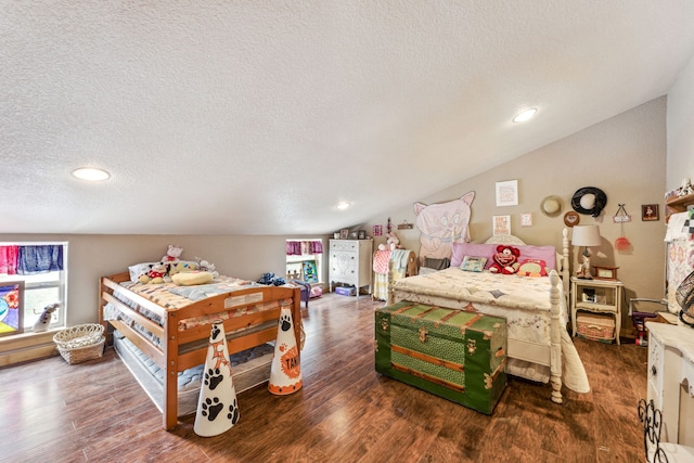 bedroom with vaulted ceiling, dark wood-style flooring, a textured ceiling, and recessed lighting