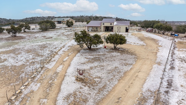 view of front of house featuring fence