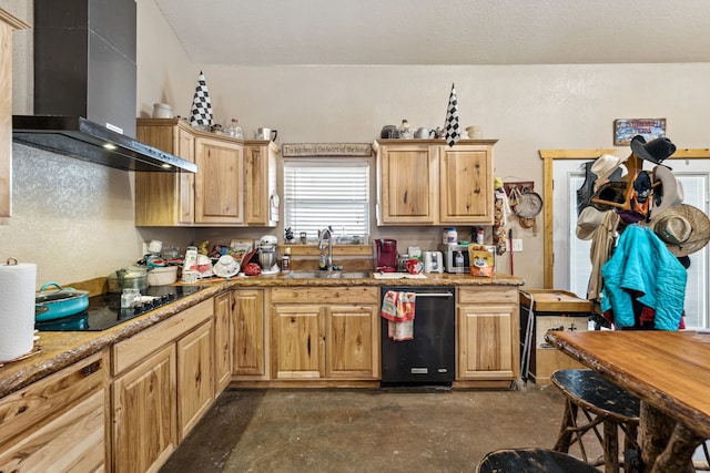 kitchen with light brown cabinetry, a sink, wall chimney range hood, concrete flooring, and black appliances