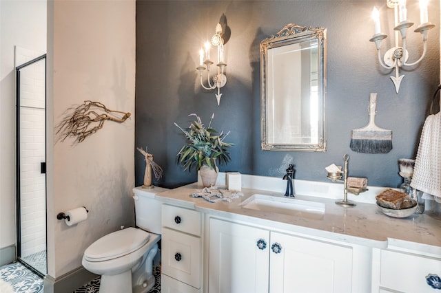 full bathroom with a stall shower, vanity, and toilet