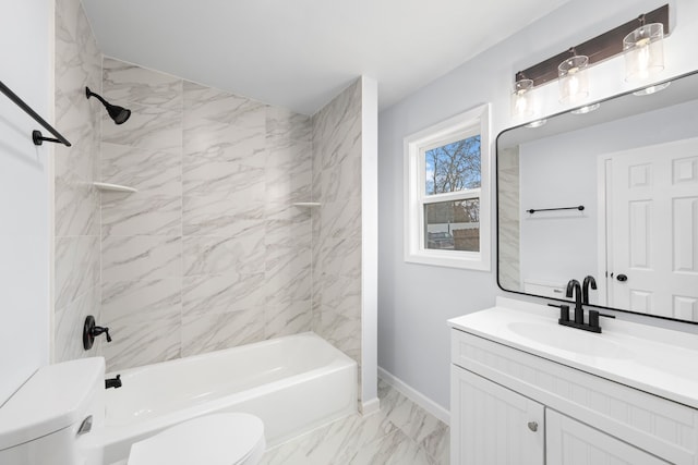 full bathroom with baseboards, toilet, marble finish floor, vanity, and washtub / shower combination