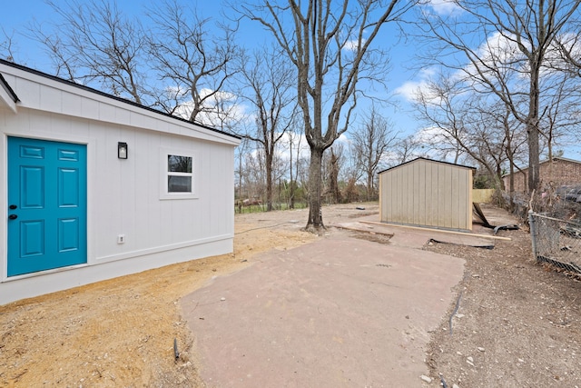 view of yard with a patio area and an outdoor structure