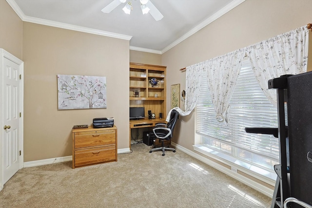 home office featuring baseboards, crown molding, and light colored carpet