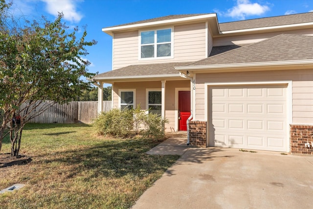 view of front of property featuring driveway, a shingled roof, an attached garage, fence, and a front yard