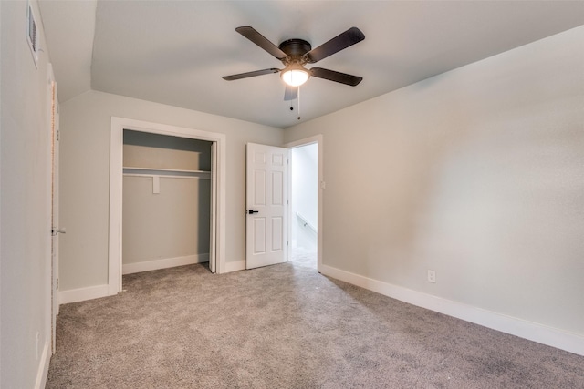 unfurnished bedroom with visible vents, baseboards, light colored carpet, ceiling fan, and a closet