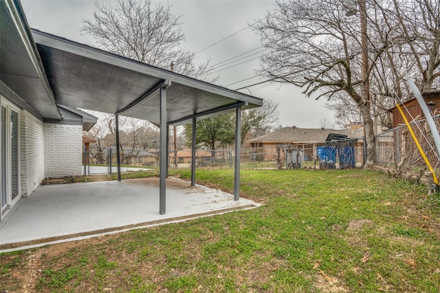 view of yard featuring a patio area and a fenced backyard