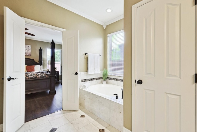 bathroom featuring connected bathroom, a ceiling fan, ornamental molding, a bath, and tile patterned floors