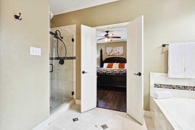 ensuite bathroom with a garden tub, ensuite bathroom, ornamental molding, a shower stall, and tile patterned flooring