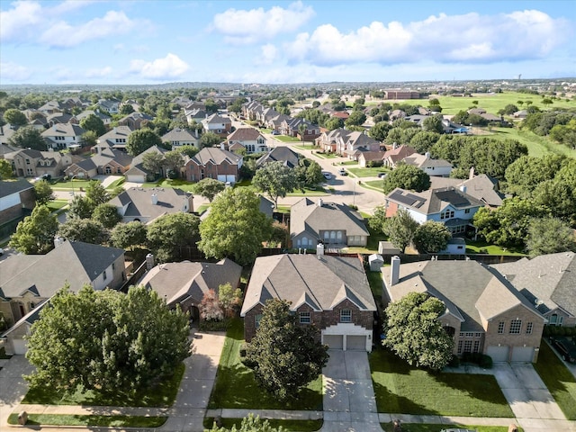 birds eye view of property with a residential view