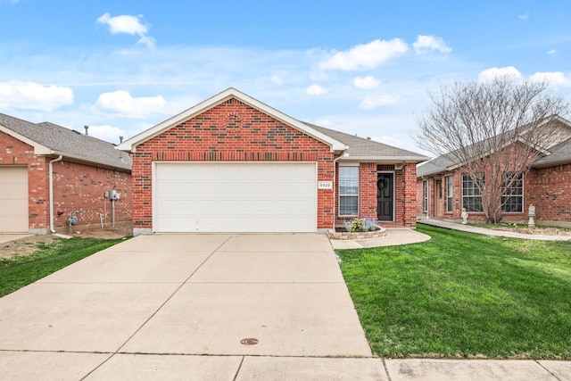 view of front facade with brick siding, a shingled roof, an attached garage, a front yard, and driveway