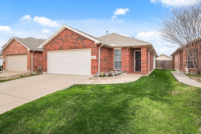 ranch-style house featuring a garage, driveway, brick siding, and a front yard