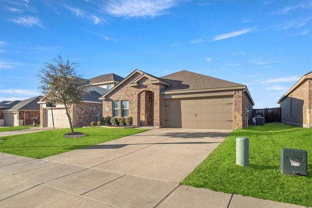 ranch-style home featuring a garage, concrete driveway, brick siding, and a front lawn