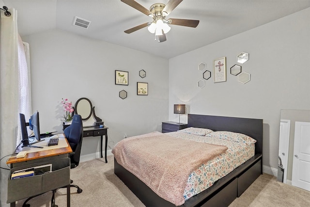 bedroom with vaulted ceiling, baseboards, visible vents, and light colored carpet