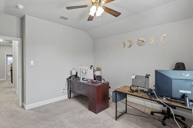 office area with attic access, visible vents, light colored carpet, ceiling fan, and vaulted ceiling