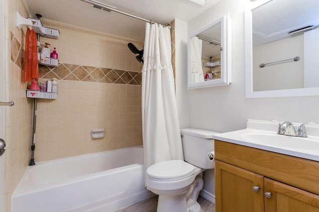 full bath featuring toilet, visible vents, shower / bath combination with curtain, and vanity