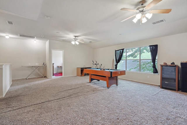 game room featuring a ceiling fan, attic access, visible vents, and carpet flooring