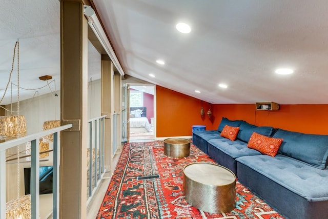 living area with lofted ceiling, wood finished floors, and recessed lighting