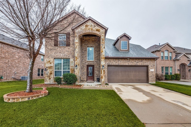 traditional home featuring driveway, brick siding, a front lawn, and an attached garage