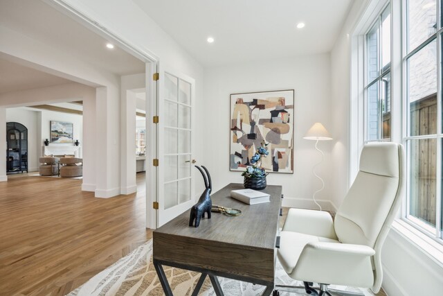 9514 Still Creek Ln, Dallas, TX 75238 - office featuring healthy amount of natural light, wood finished floors, baseboards, recessed lighting, and french doors