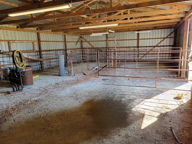 interior space featuring metal wall