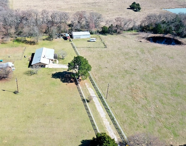 birds eye view of property featuring a rural view