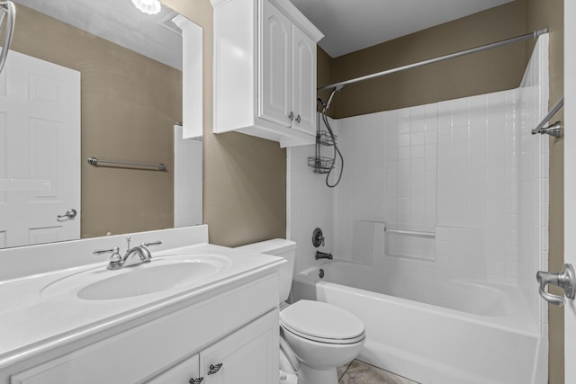 bathroom with washtub / shower combination, vanity, and toilet