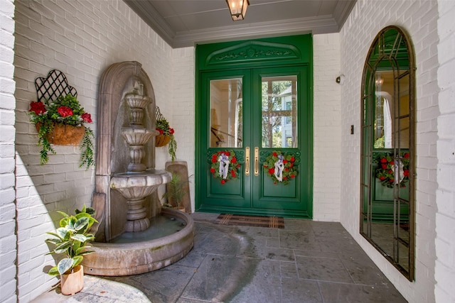 entrance to property with french doors and brick siding