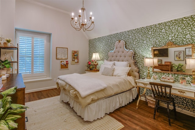 bedroom with an inviting chandelier, ornamental molding, wood finished floors, baseboards, and wallpapered walls