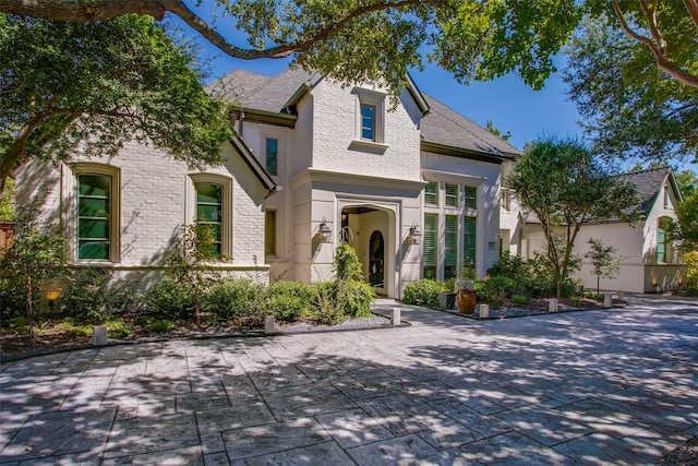 view of front of property with brick siding