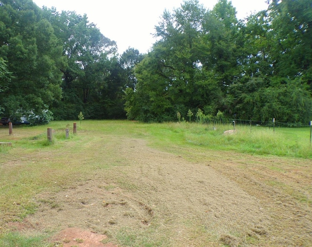 view of yard with a rural view