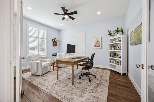 office featuring baseboards, dark wood-style flooring, recessed lighting, and radiator