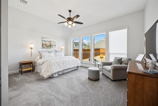 bedroom featuring visible vents, baseboards, lofted ceiling, ceiling fan, and dark carpet