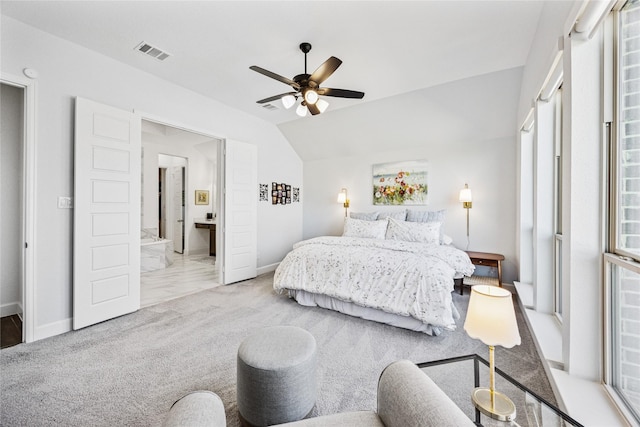 carpeted bedroom with lofted ceiling, visible vents, ceiling fan, and baseboards