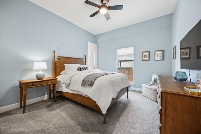 bedroom featuring a ceiling fan, carpet flooring, and baseboards