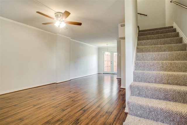 4039 Cole Ave Unit 104, Dallas, TX 75204 - staircase with wood finished floors, crown molding, a ceiling fan, and baseboards
