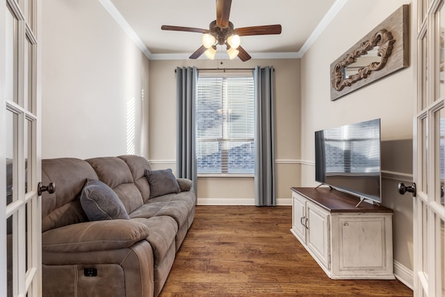 living area featuring dark wood-type flooring, crown molding, and french doors