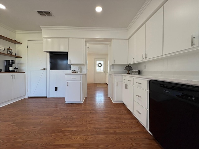 kitchen with visible vents, white cabinets, dishwasher, light countertops, and crown molding