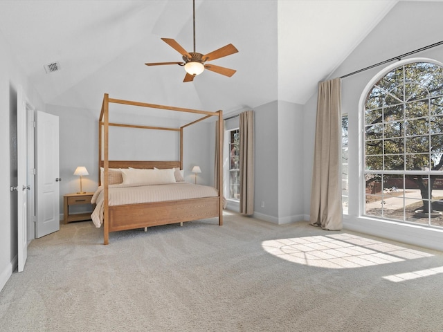 bedroom with visible vents, baseboards, carpet, high vaulted ceiling, and a ceiling fan