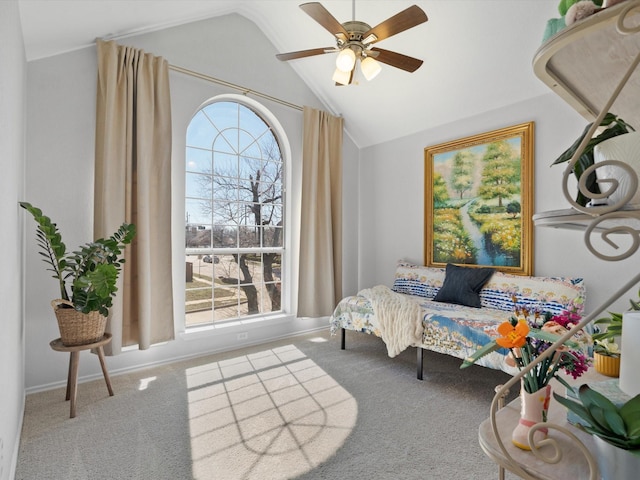 sitting room featuring lofted ceiling, carpet, and ceiling fan