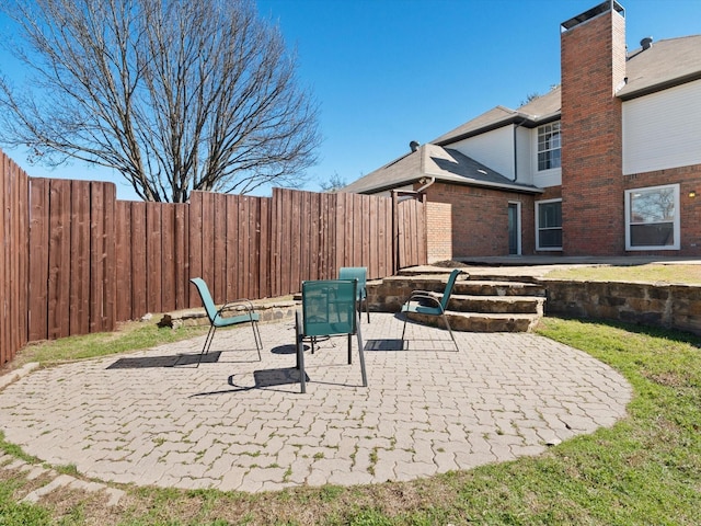 view of patio with a fenced backyard